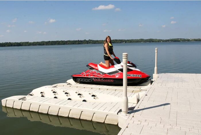 A women enjoying the ease of use of Floating Docks wave armour Apex A6 dock