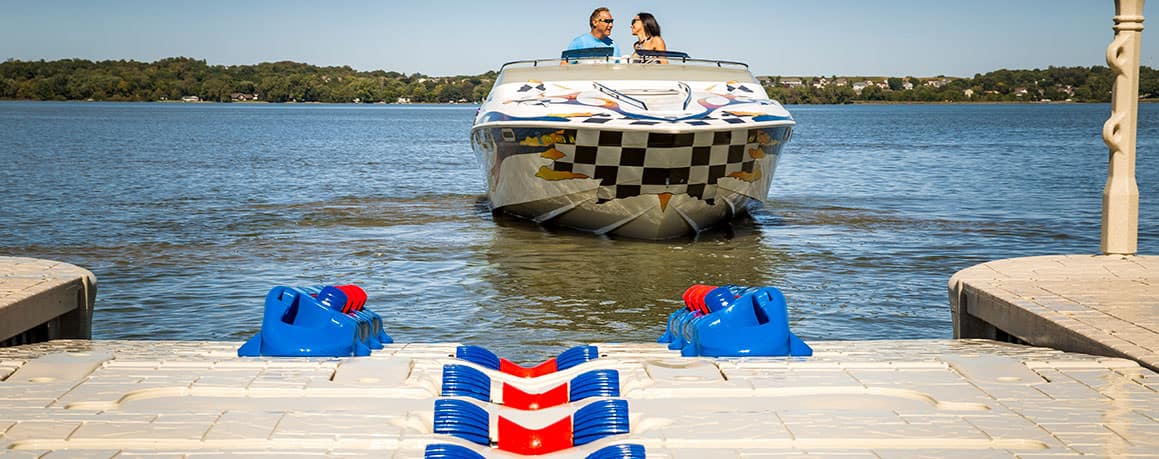 A boating couple enjoys Floating Dock's new installations.